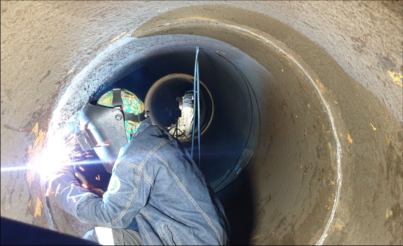 welding penstock pipe hydro plant repair PT DIM